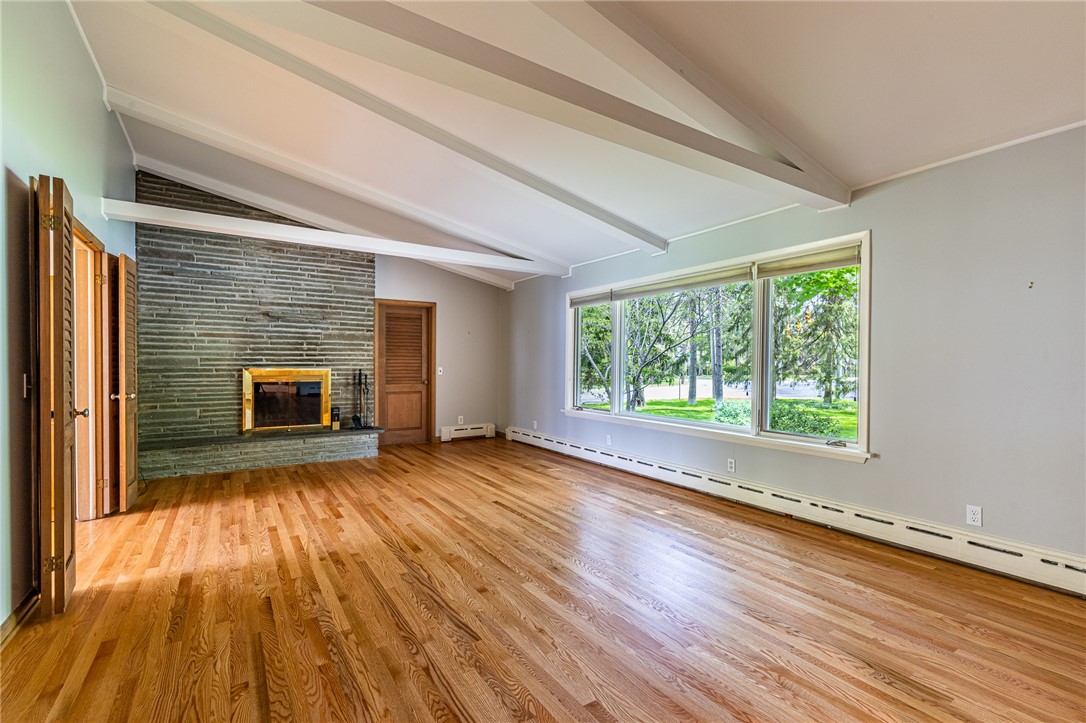 1615 Clover Street Brighton, NY 14618 - Photo 6 of 48 Fireplace in the living room.