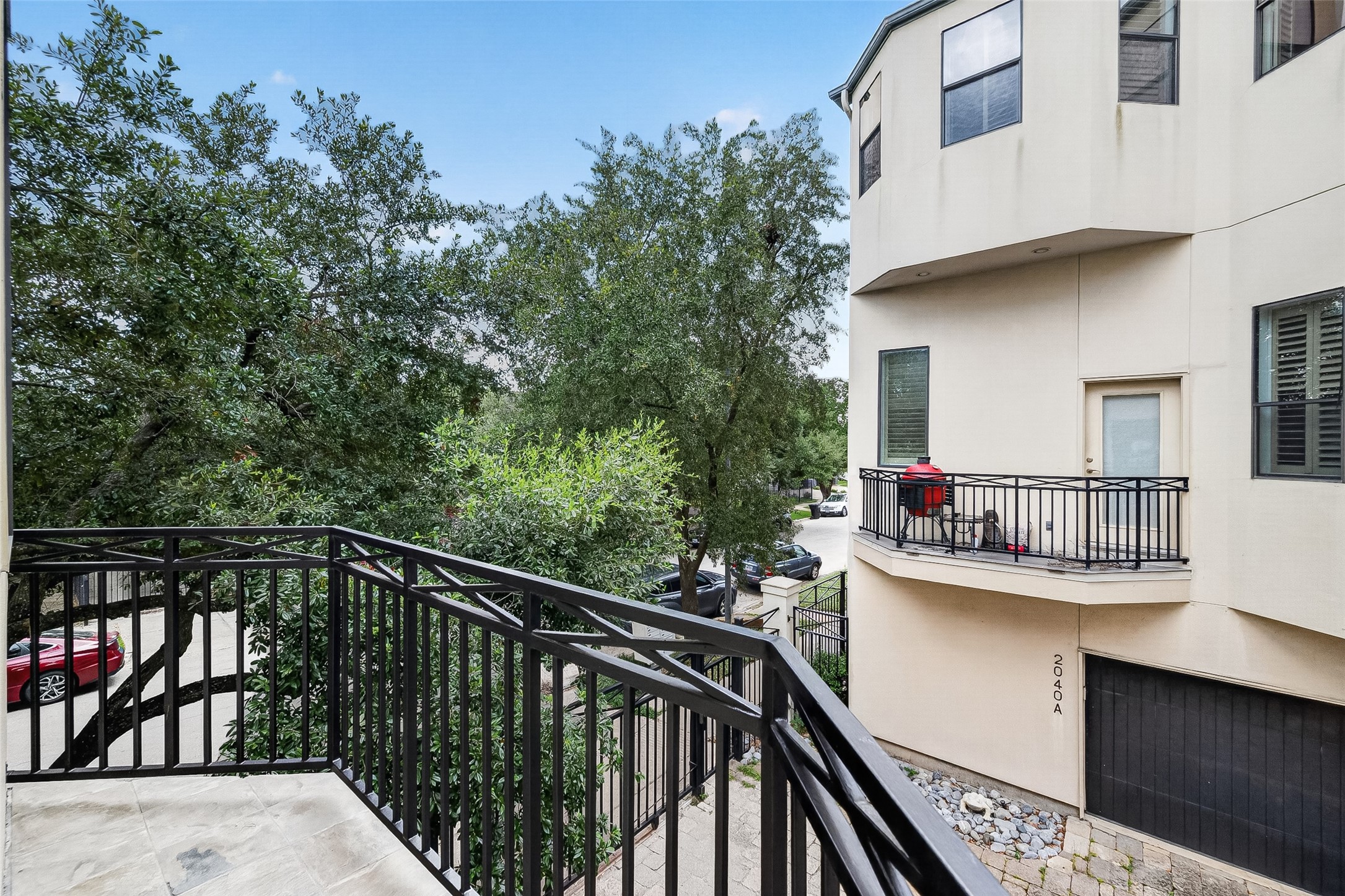 2034 Colquitt Street, Unit A Houston, TX 77098 - Photo 17 of 41 View from the 2nd story, kitchen balcony.