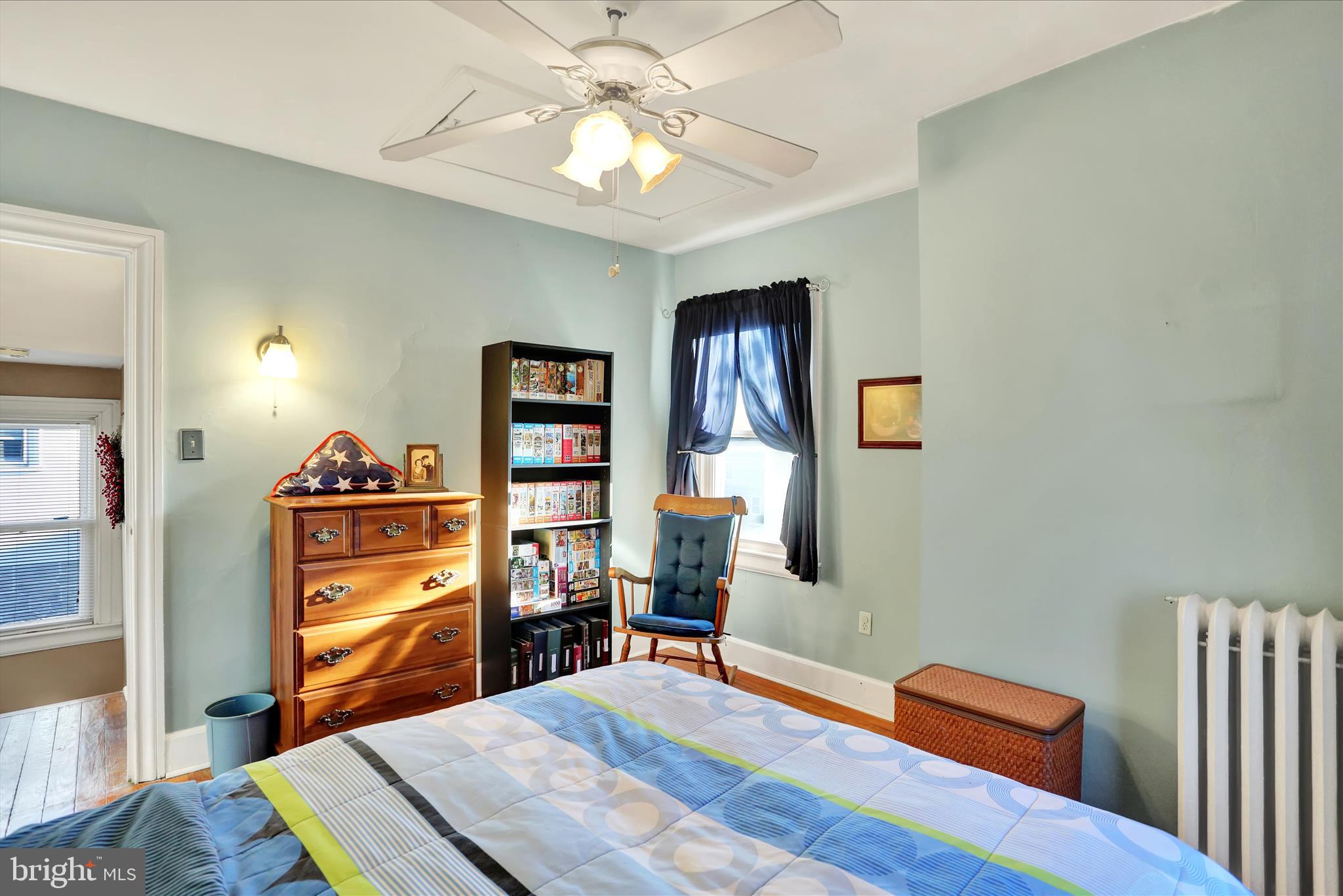 117 Center Street Reading, PA 19606 - Photo 16 of 28 a bedroom with a bed and a dresser in it