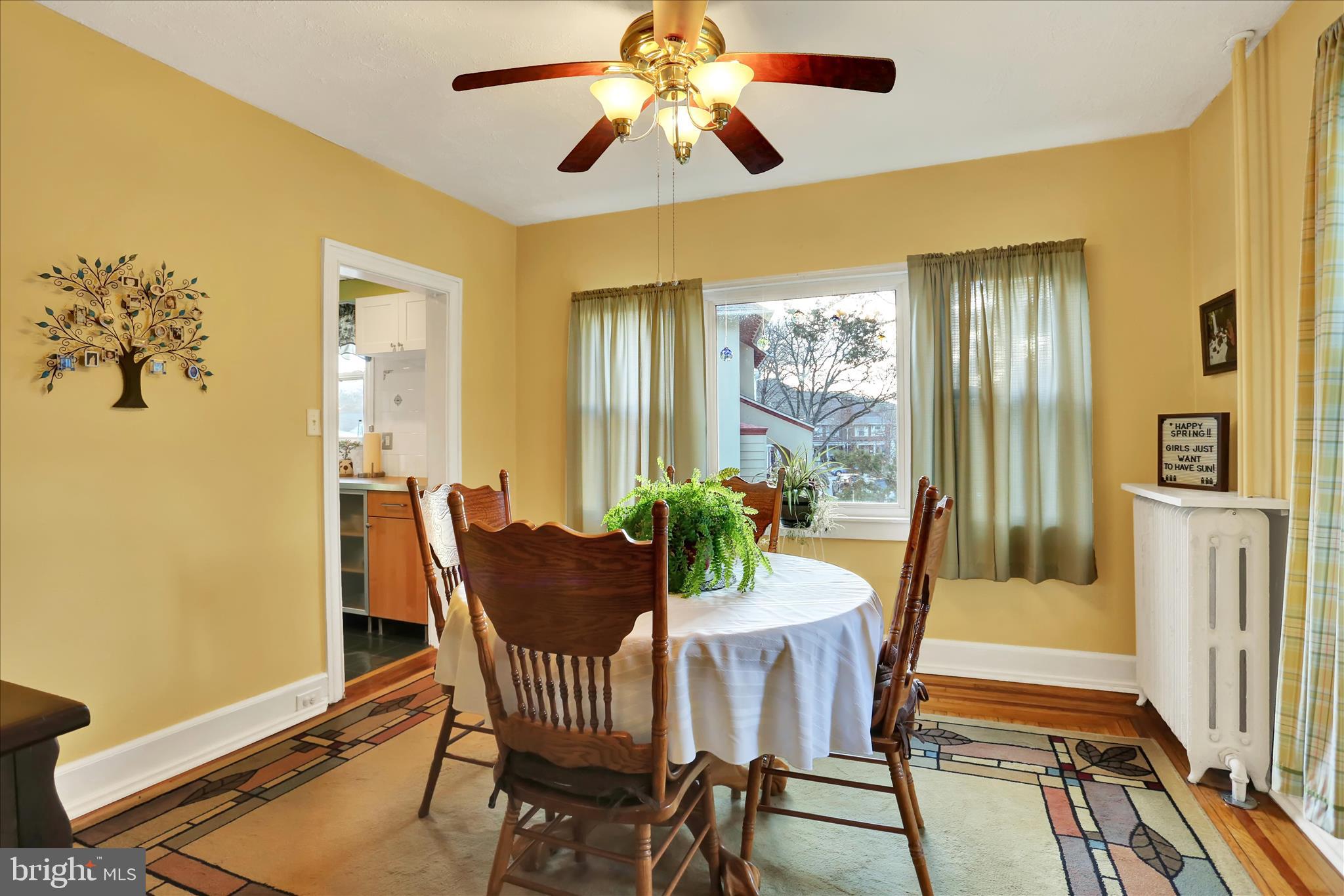 117 Center Street Reading, PA 19606 - Photo 9 of 28 a dining room with furniture a chandelier and wooden floor