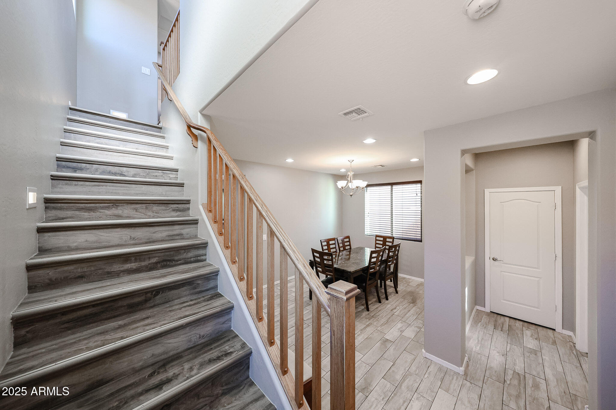 3312 West Florimond Road Phoenix, AZ 85086 - Photo 23 of 69 Staircase with newer flooring