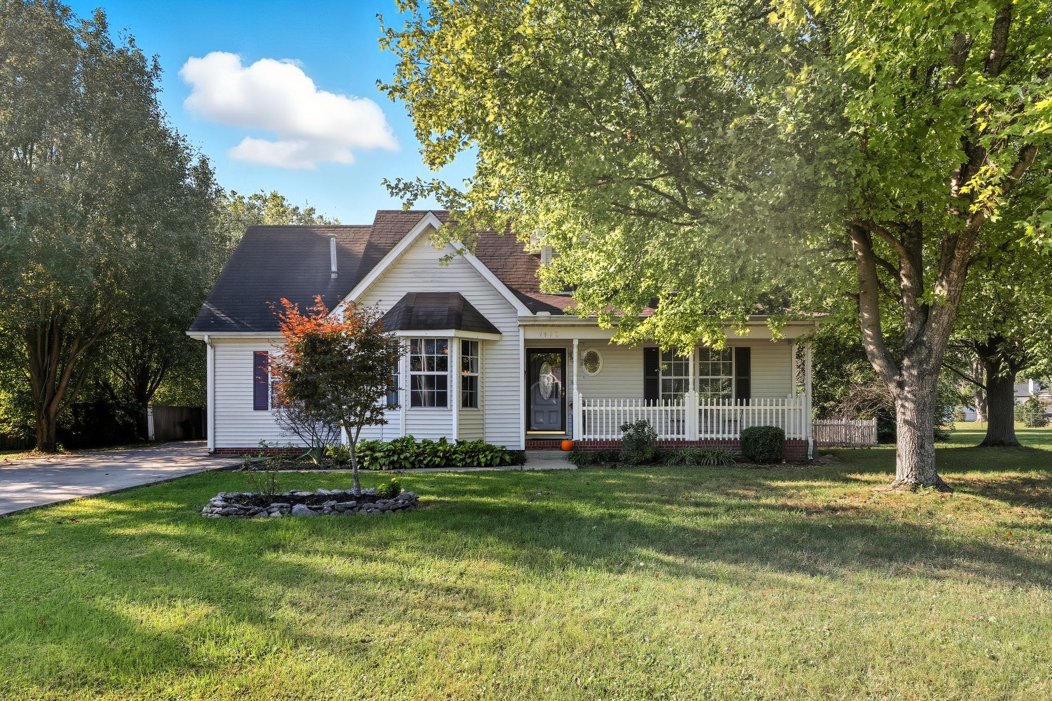 1419 Cason Trail Murfreesboro, TN 37128 - Photo 1 of 25 a front view of a house with a yard