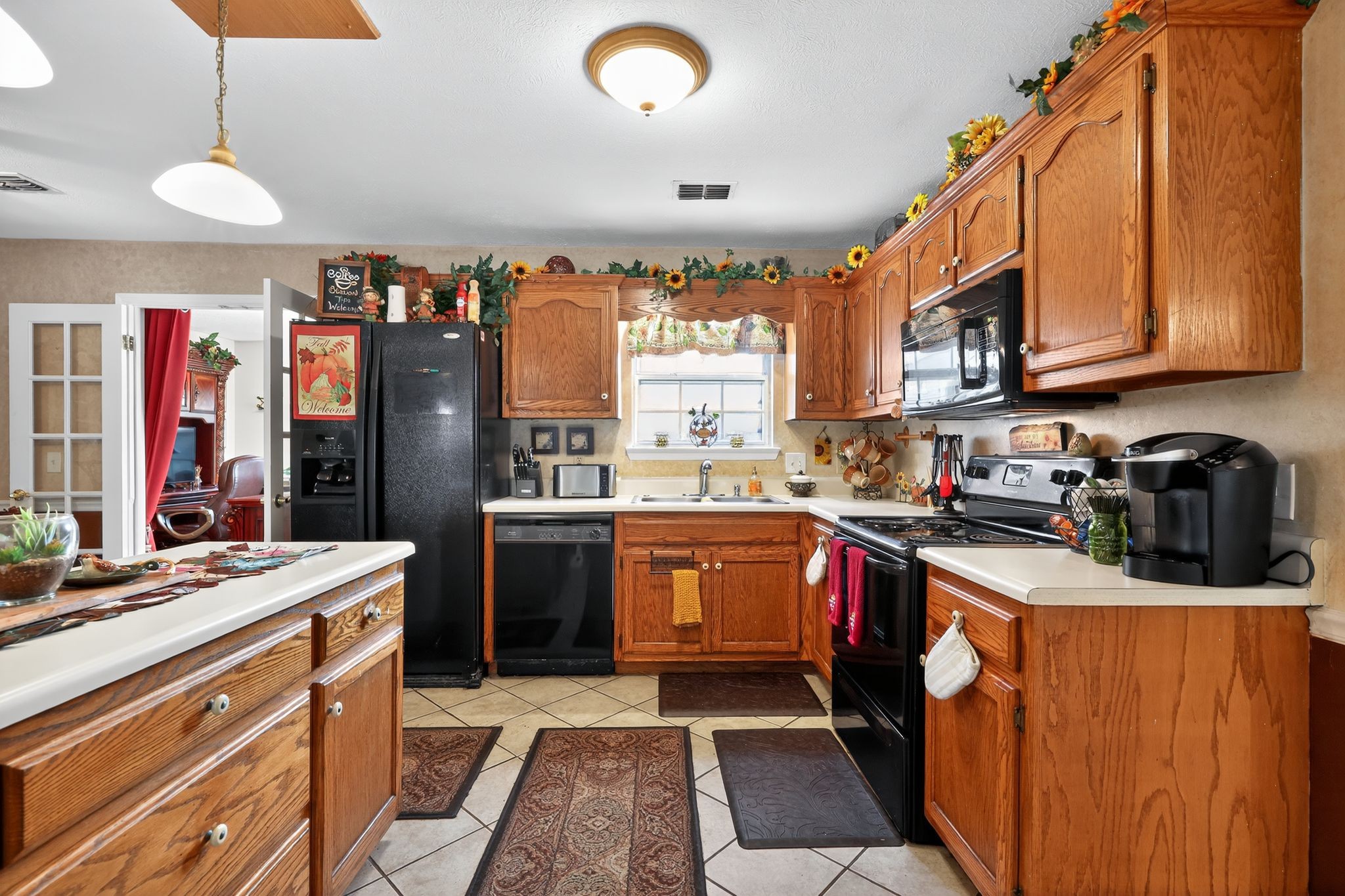 1419 Cason Trail Murfreesboro, TN 37128 - Photo 2 of 25 a kitchen with stainless steel appliances granite countertop a sink stove and refrigerator