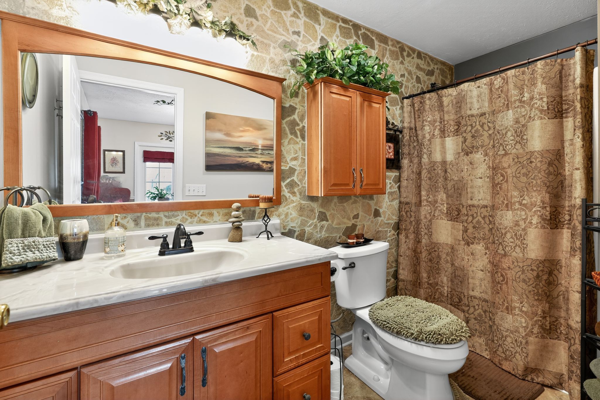 1419 Cason Trail Murfreesboro, TN 37128 - Photo 6 of 25 a bathroom with a granite countertop sink mirror vanity and toilet