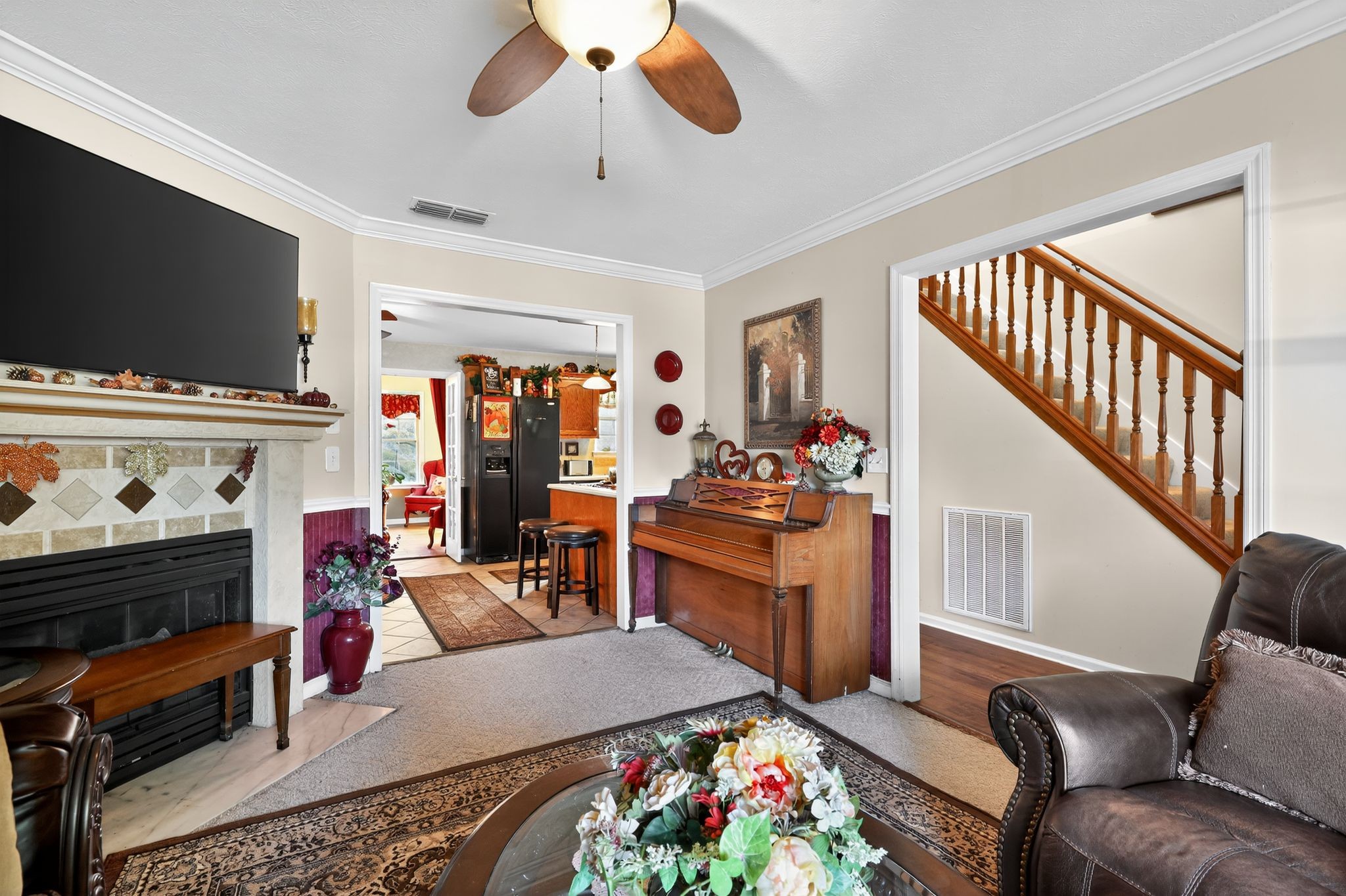 1419 Cason Trail Murfreesboro, TN 37128 - Photo 9 of 25 a living room with furniture and a flat screen tv