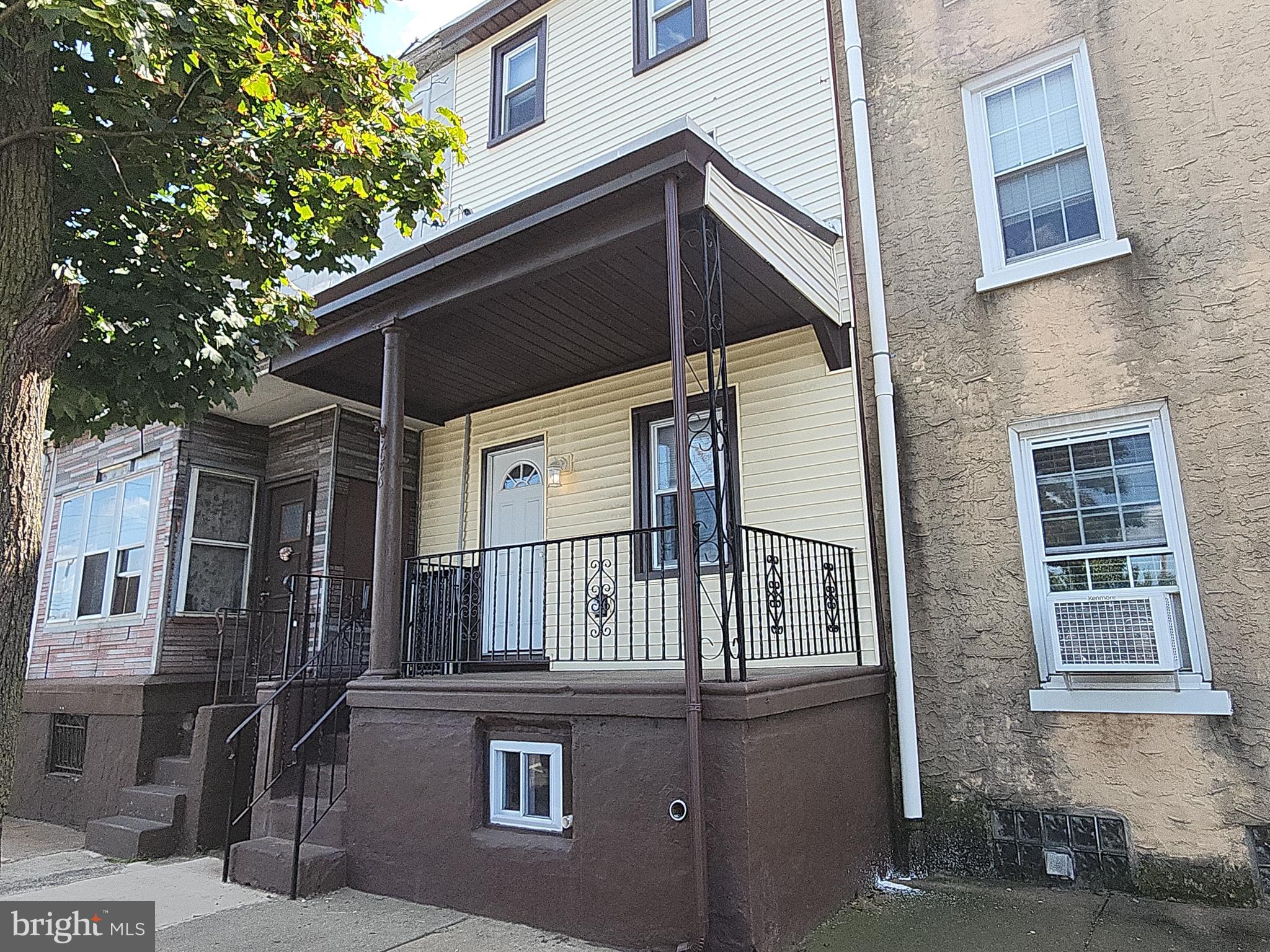 a front view of a house with balcony