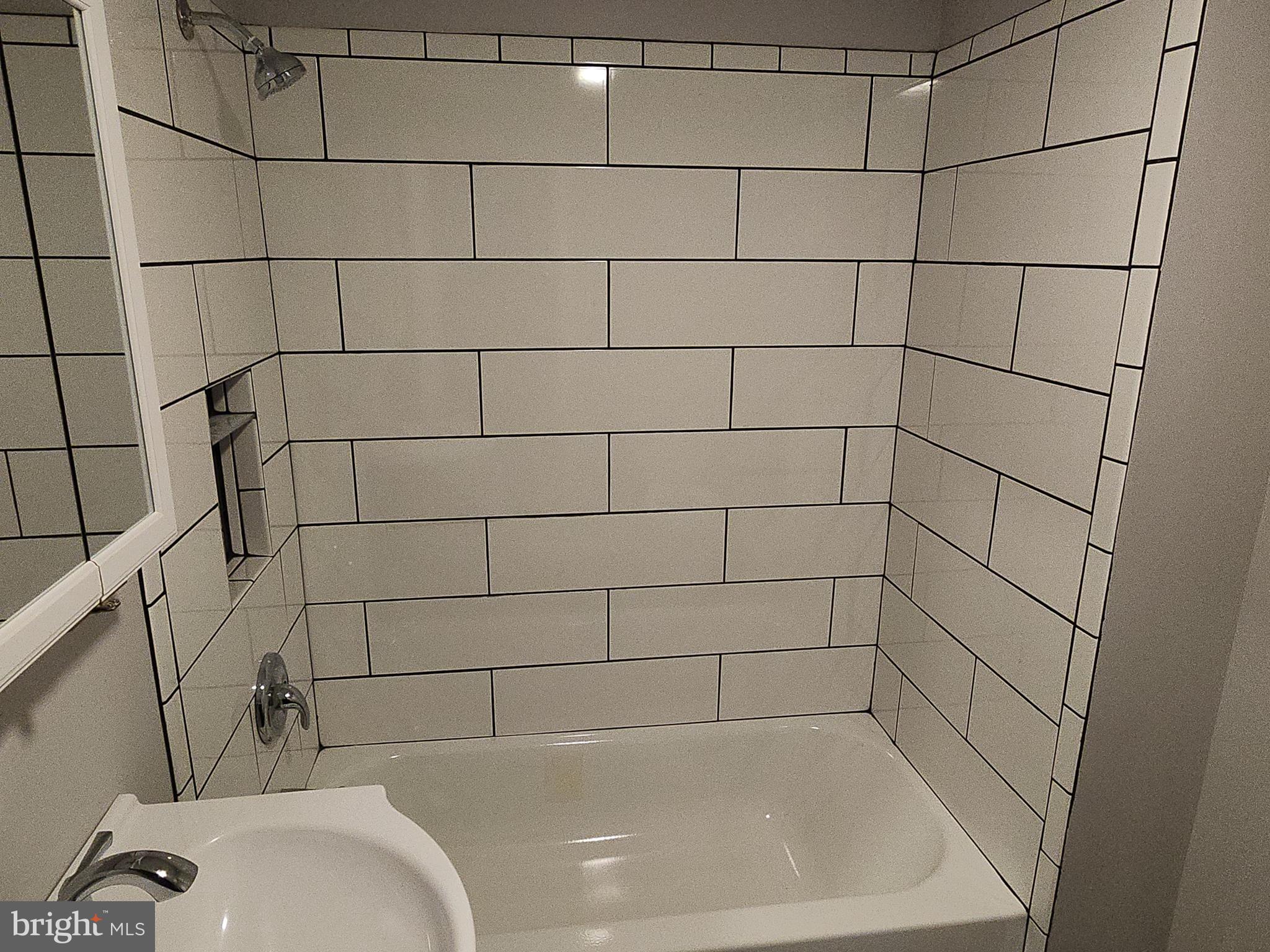 2686 Bridge Street Philadelphia, PA 19137 - Photo 14 of 30 a bathroom with a bathtub