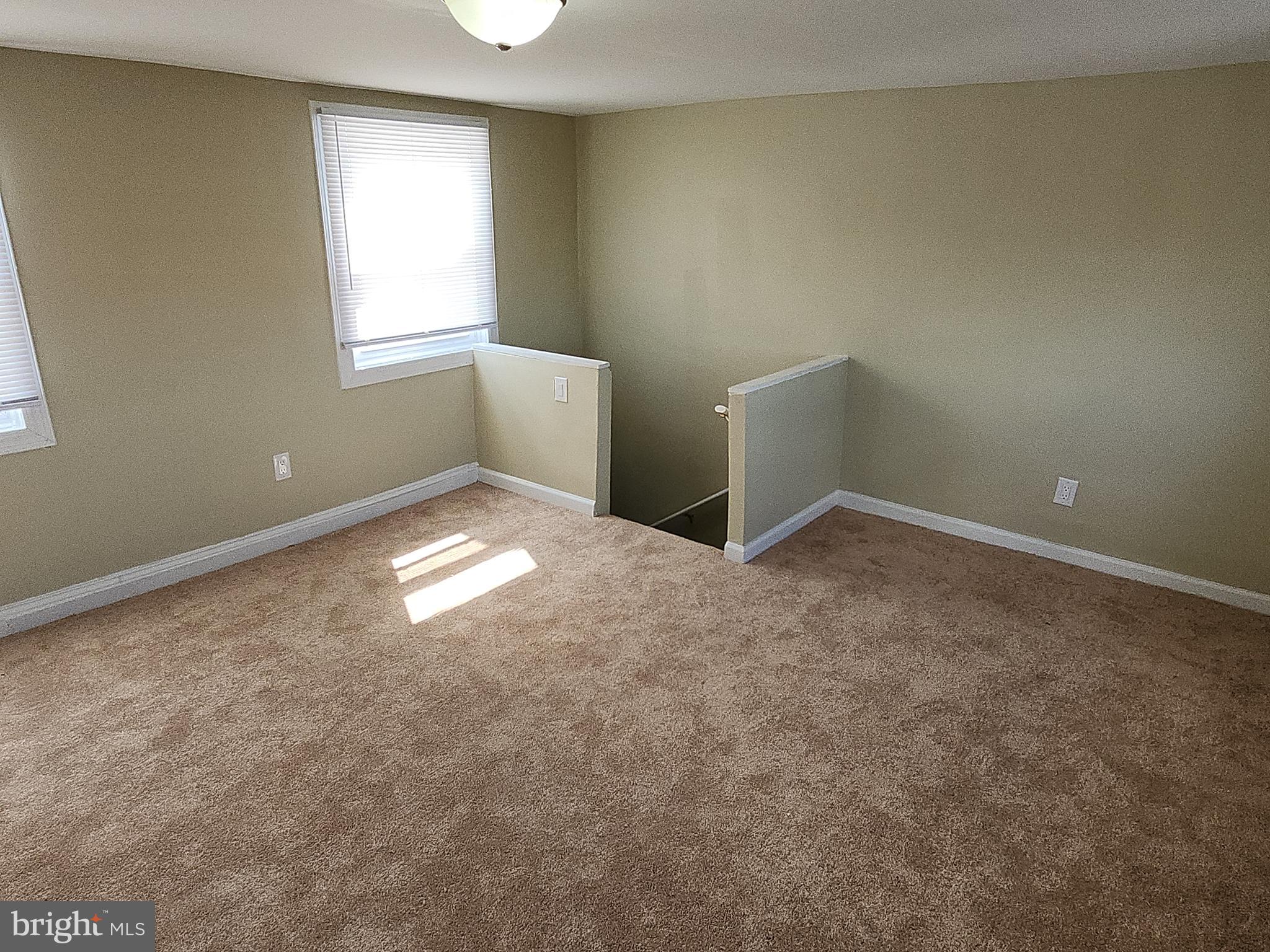 2686 Bridge Street Philadelphia, PA 19137 - Photo 23 of 30 an empty room with windows