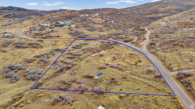 349 West Mountain View Road, Unit 349 Fairview, UT 84629 - Photo 5 of 26 Expansive undeveloped land parcel featuring a small shed structure