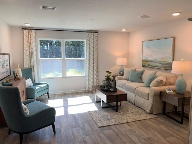 2826 Patriots Rdg Drive Crestview, FL 32539 - Photo 6 of 25 a living room with furniture and a window