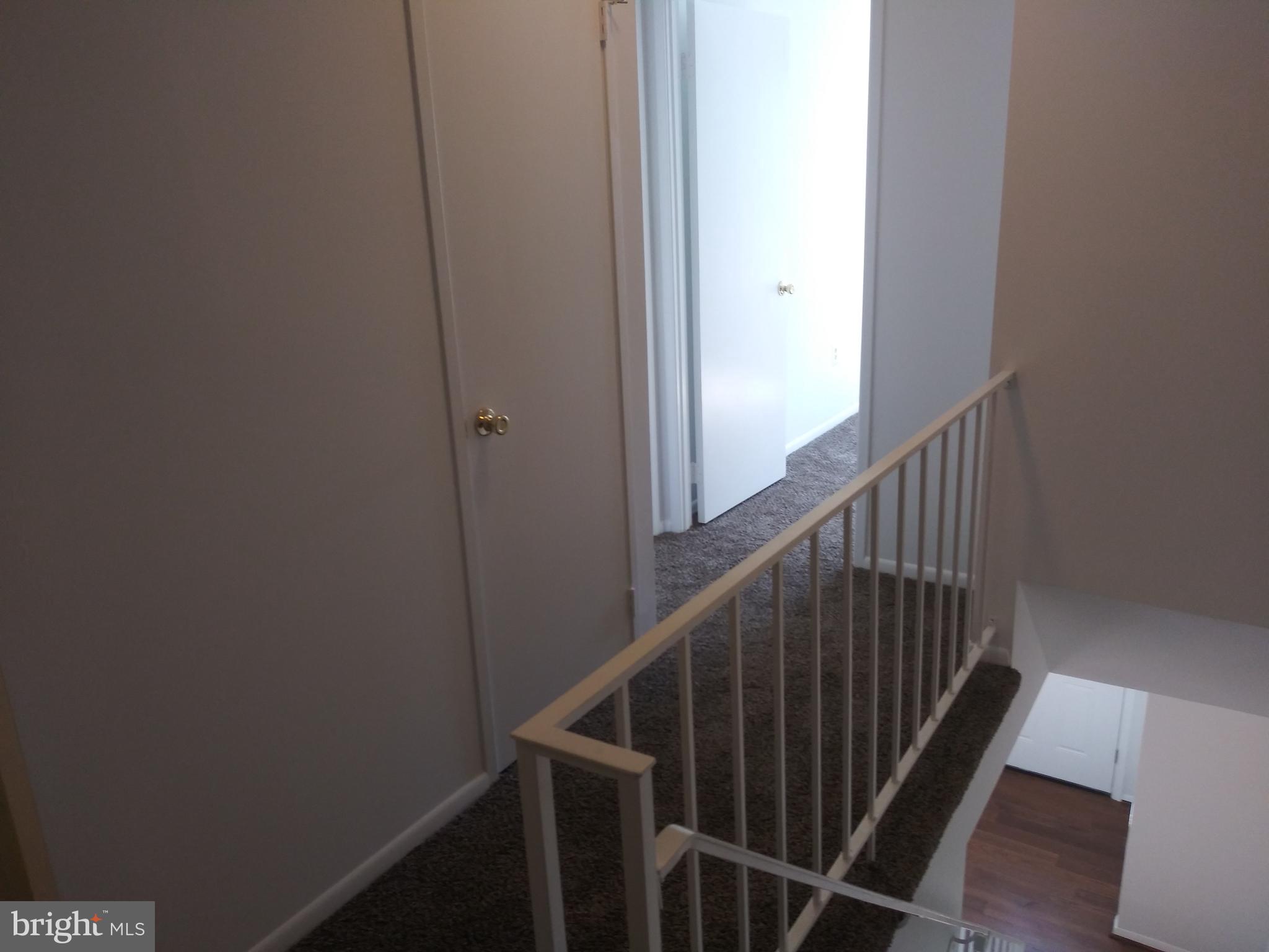 4107 Peppertree Lane Silver Spring, MD 20906 - Photo 10 of 23 Second level hallway leading to bedrooms # 2 & #3