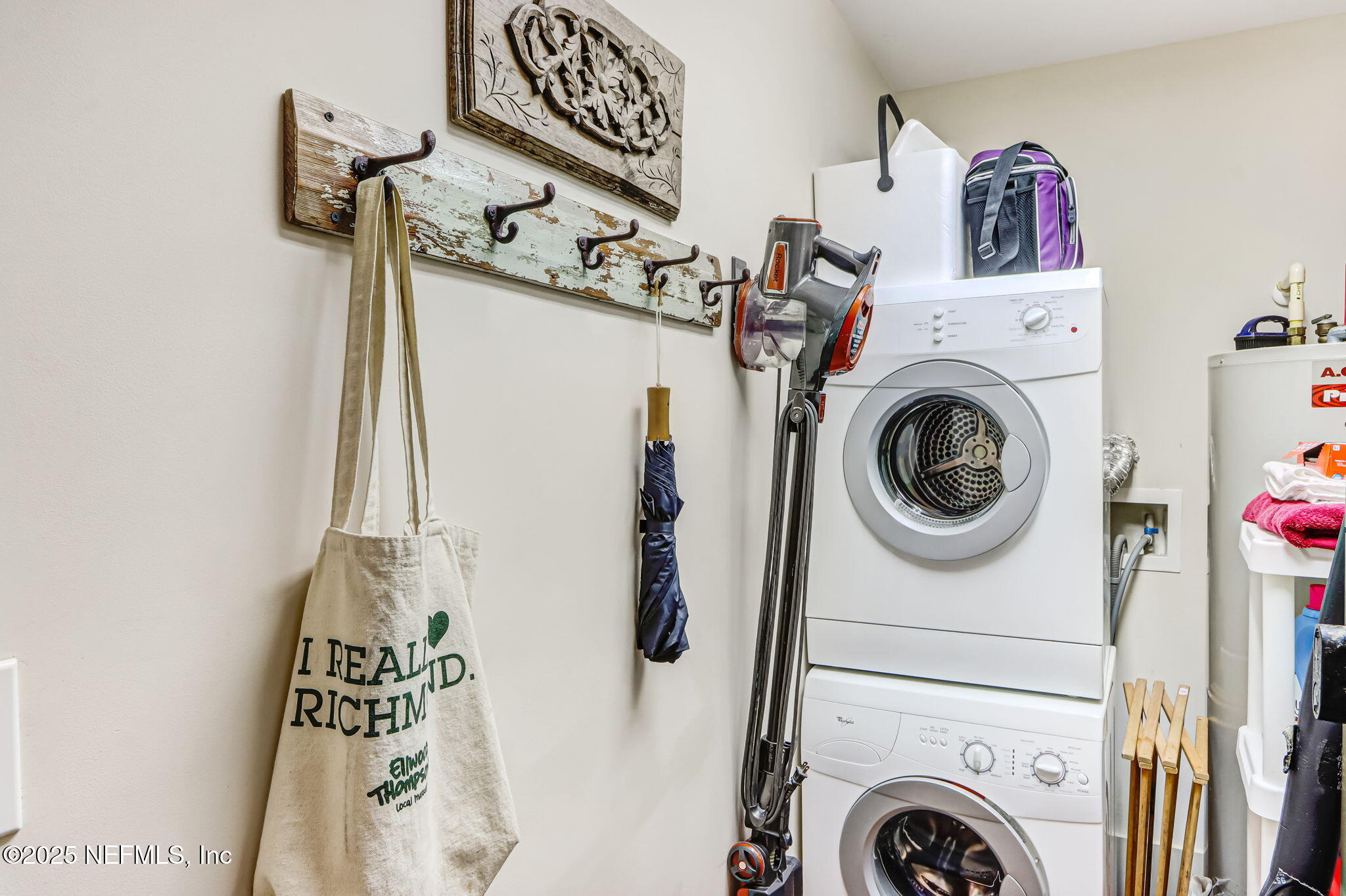 301 East Bay Street, Unit 405 Jacksonville, FL 32202 - Photo 22 of 42 a utility room with dryer and washer