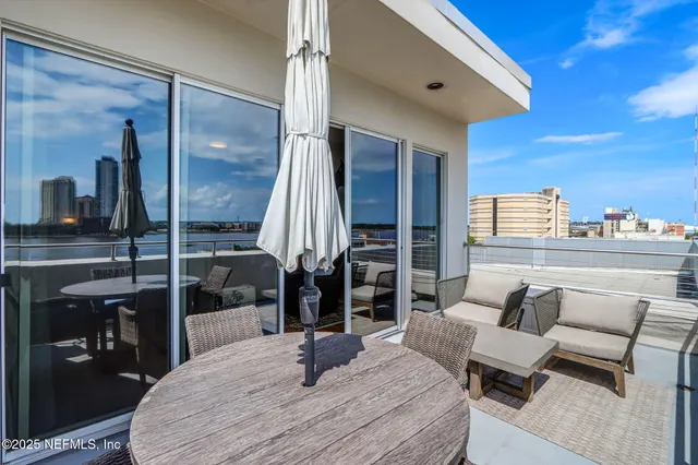 a view of a swimming pool and a yard