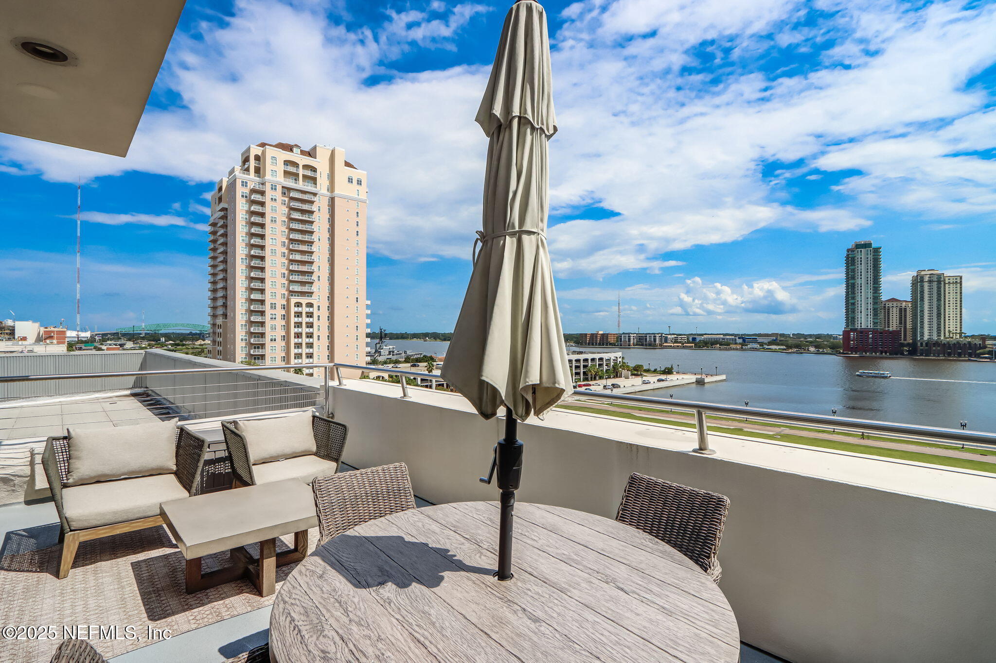 301 East Bay Street, Unit 405 Jacksonville, FL 32202 - Photo 37 of 42 a view of terrace with seating area and barbeque oven
