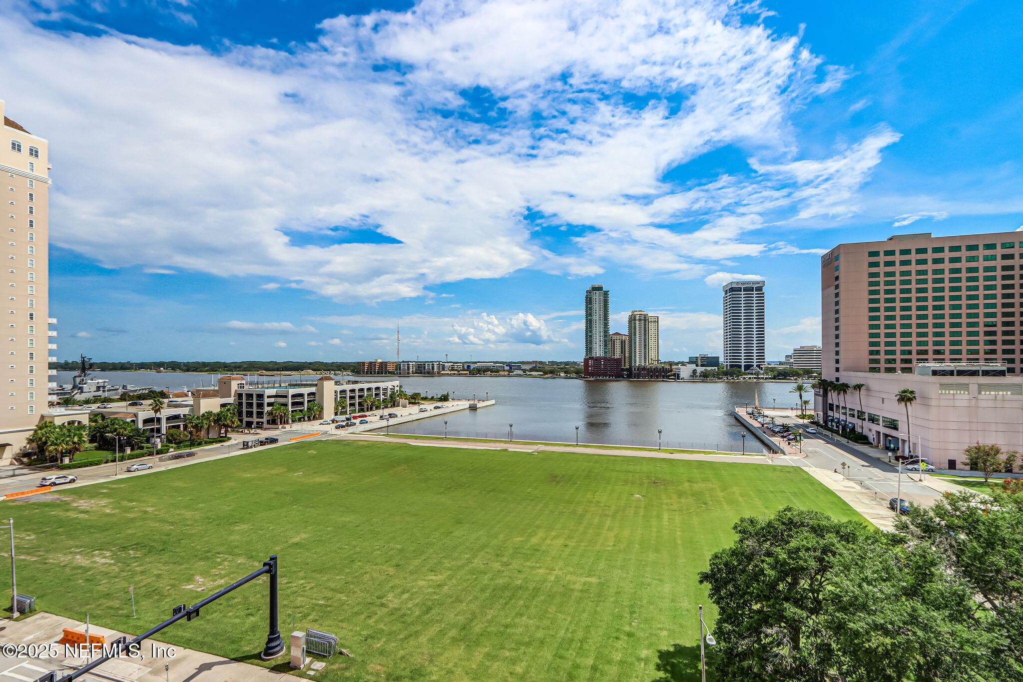301 East Bay Street, Unit 405 Jacksonville, FL 32202 - Photo 38 of 42 a view of a swimming pool and a yard