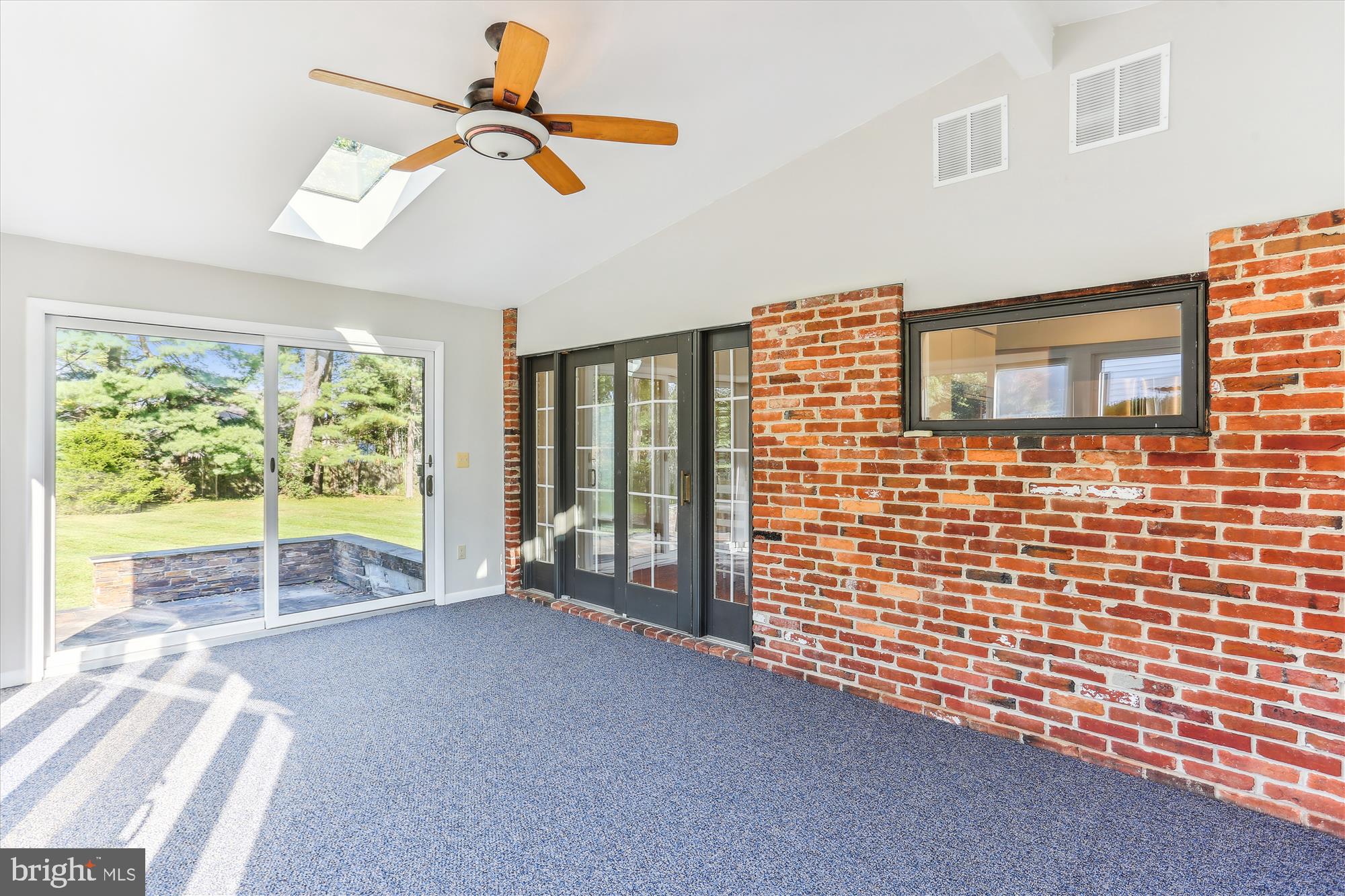 816 Olive Drive Silver Spring, MD 20905 - Photo 11 of 72 Sunroom with skylights and ceiling fan