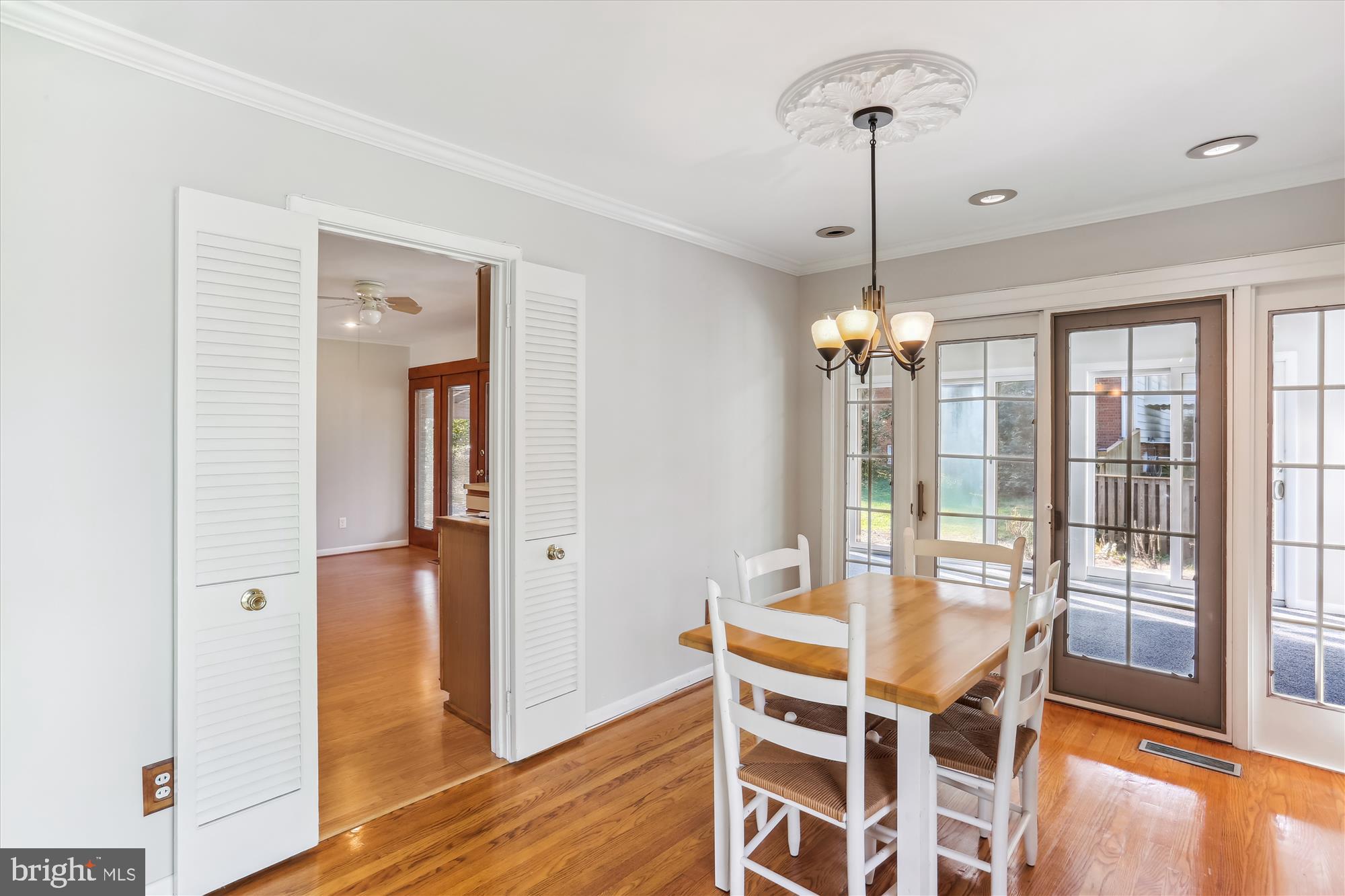 816 Olive Drive Silver Spring, MD 20905 - Photo 14 of 72 Dining room with slider to sunroom