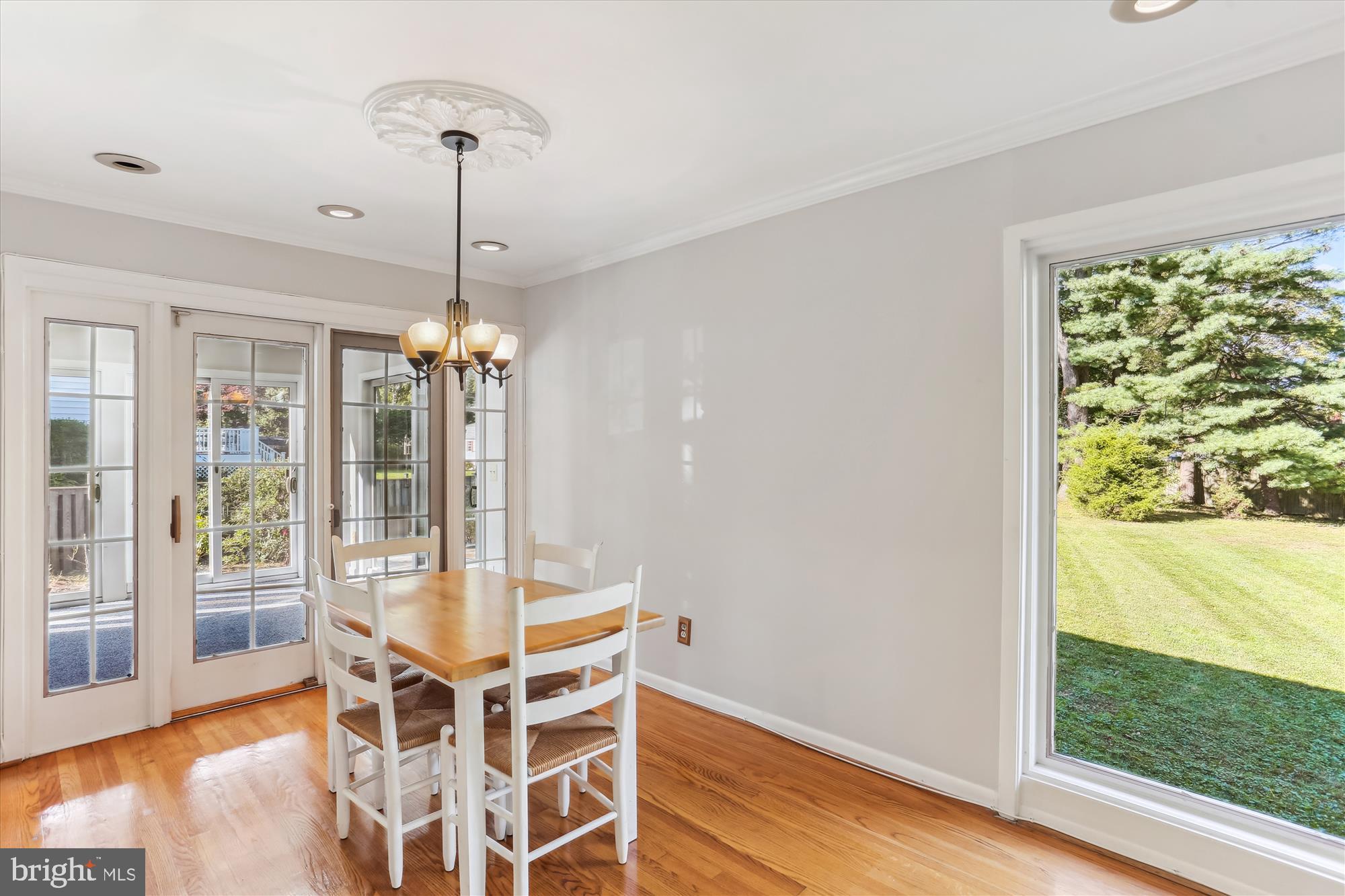 816 Olive Drive Silver Spring, MD 20905 - Photo 16 of 72 Dining room with slider to sunroom