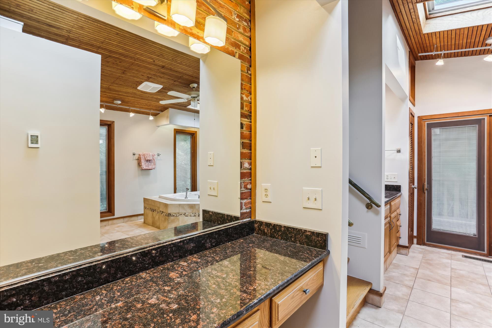 816 Olive Drive Silver Spring, MD 20905 - Photo 27 of 72 Primary bathroom with vaulted ceilings