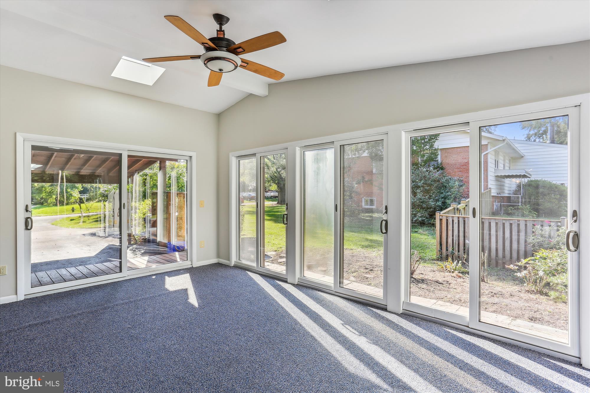 816 Olive Drive Silver Spring, MD 20905 - Photo 9 of 72 Sunroom with skylights and ceiling fan