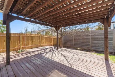 a view of small space with wooden deck