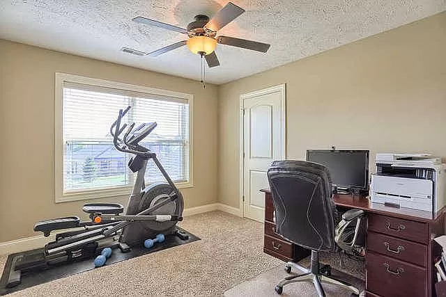 5102 Jacks Boulevard Champaign, IL 61822 - Photo 32 of 36 a view of a workspace with furniture and a window