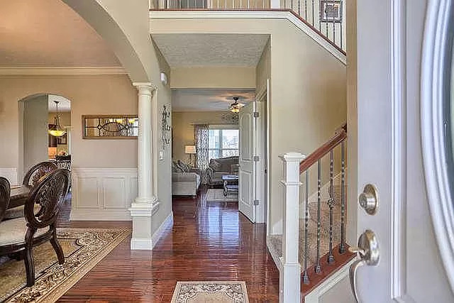 5102 Jacks Boulevard Champaign, IL 61822 - Photo 4 of 36 a view of a hallway with wooden floor and windows