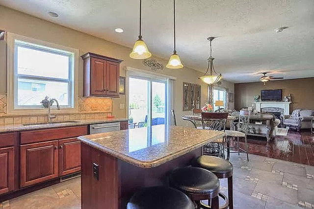 5102 Jacks Boulevard Champaign, IL 61822 - Photo 7 of 36 a kitchen with lots of counter space dining table and chairs