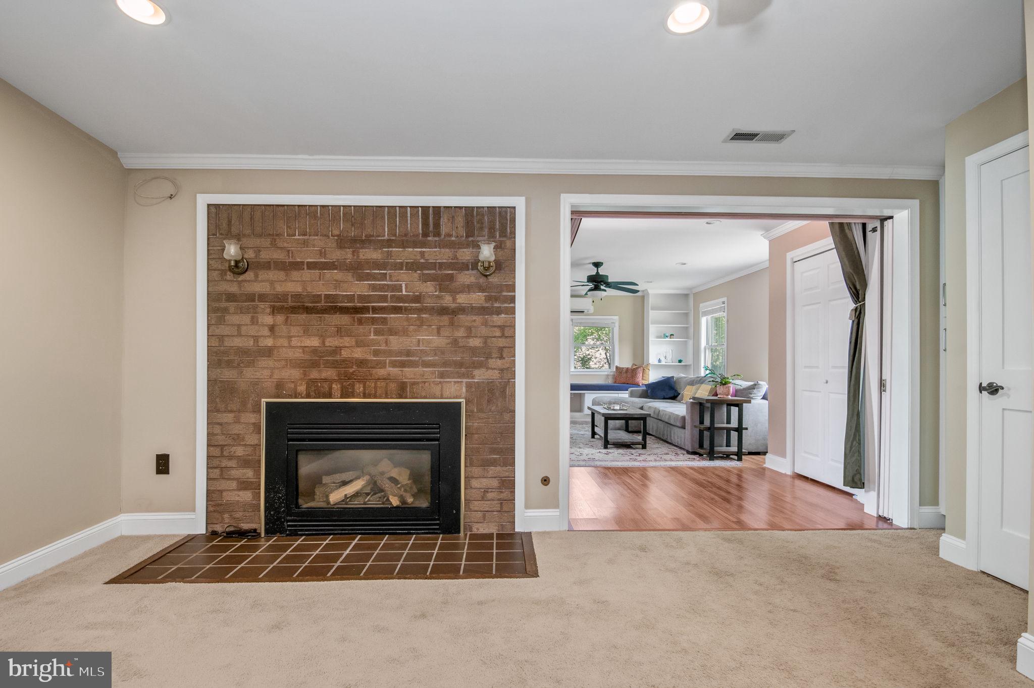 3108 Burgundy Road Alexandria, VA 22303 - Photo 13 of 39 Family room with fireplace!