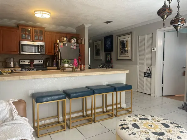 a bathroom with a sink a mirror and a bathtub