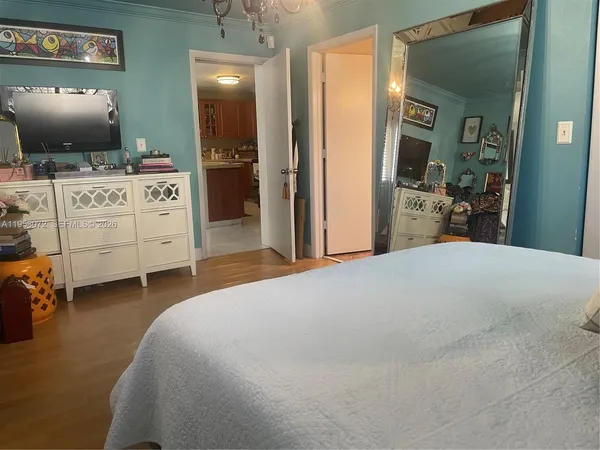 a bedroom with a bed and furniture