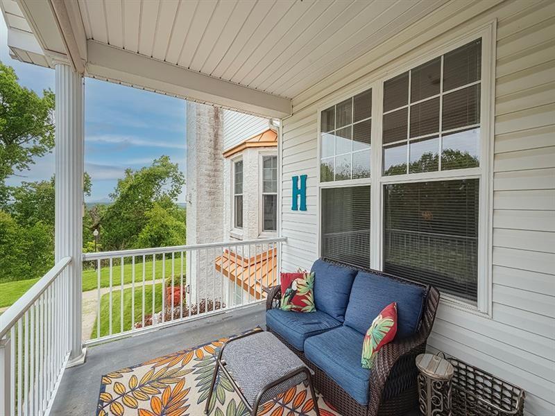 232 Adams Pointe Boulevard, Unit 6 Mars, PA 16046 - Photo 18 of 27 a balcony view with a couch