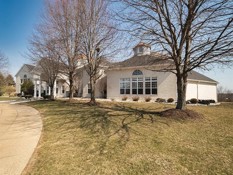 232 Adams Pointe Boulevard, Unit 6 Mars, PA 16046 - Photo 24 of 27 a front view of a house with a yard
