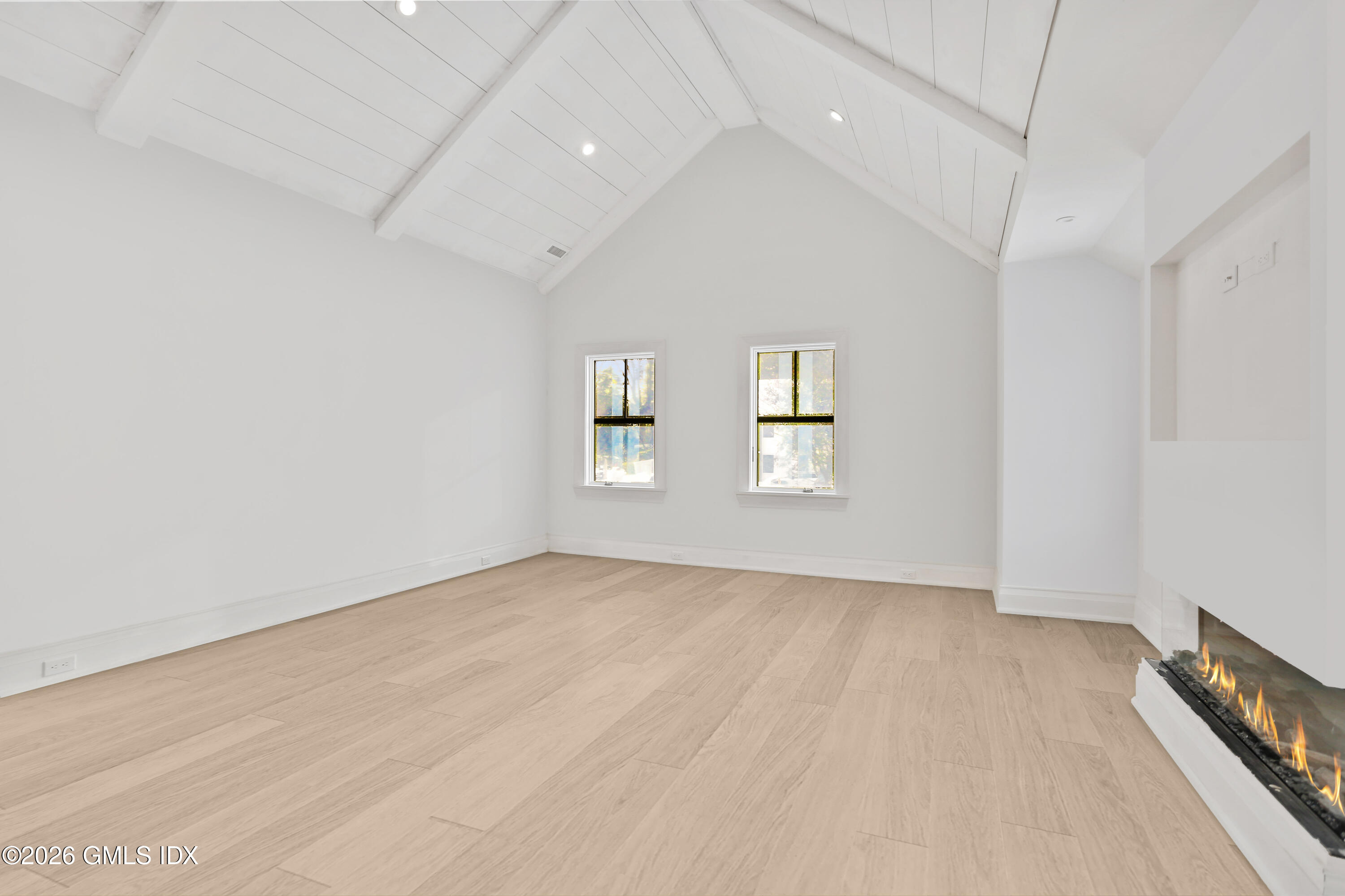 112 Sheep Hill Road Riverside, CT 06878 - Photo 12 of 30 an empty room with windows