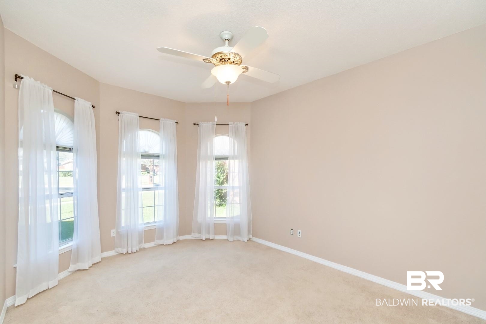 6117 Lennox Place Mobile, AL 36693 - Photo 32 of 39 Empty room featuring baseboards, light carpet, and a ceiling fan