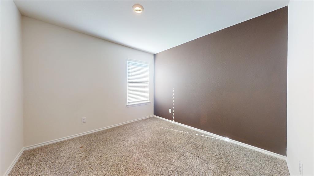 1616 Flt Rdg Court Royse City, TX 75189 - Photo 16 of 26 a view of an empty room with a window