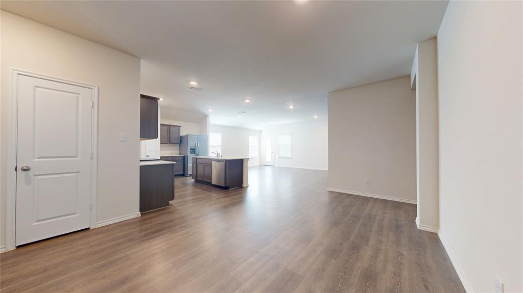 1616 Flt Rdg Court Royse City, TX 75189 - Photo 6 of 26 a view of a kitchen with wooden floor