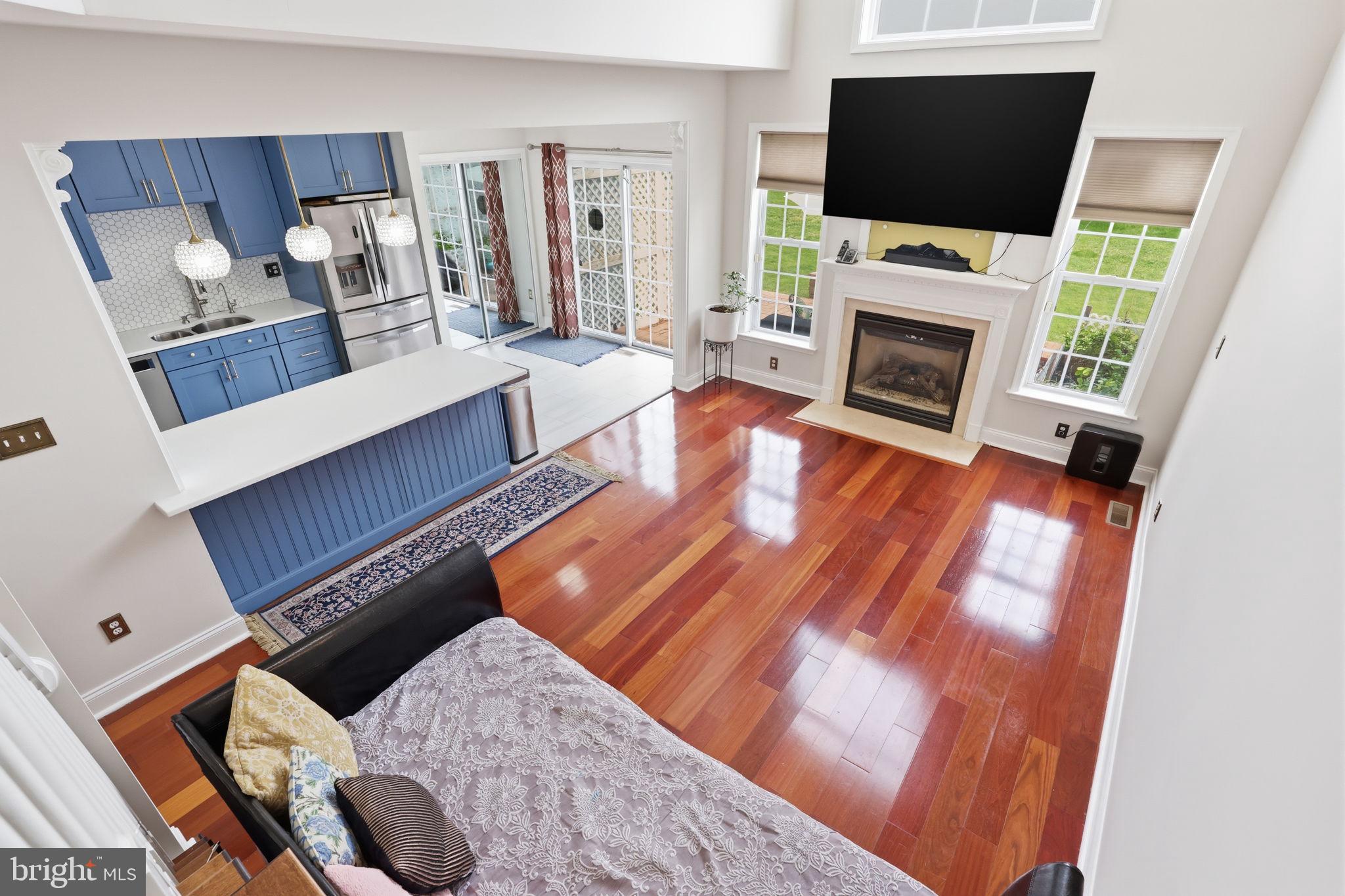 7 Wellington Road Newtown, PA 18940 - Photo 23 of 49 a living room with furniture and a flat screen tv