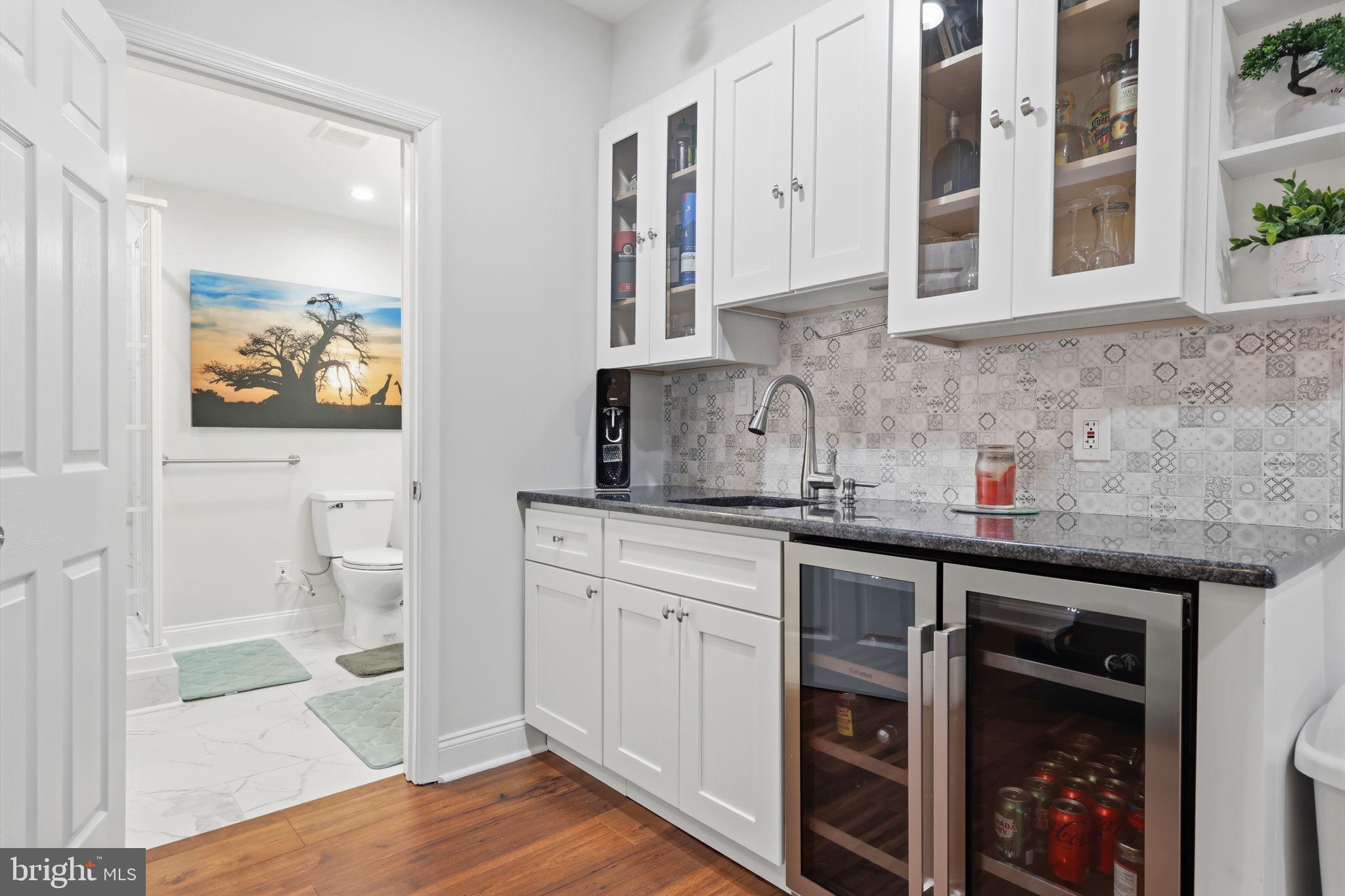 7 Wellington Road Newtown, PA 18940 - Photo 29 of 49 a kitchen with stainless steel appliances granite countertop a sink and cabinets