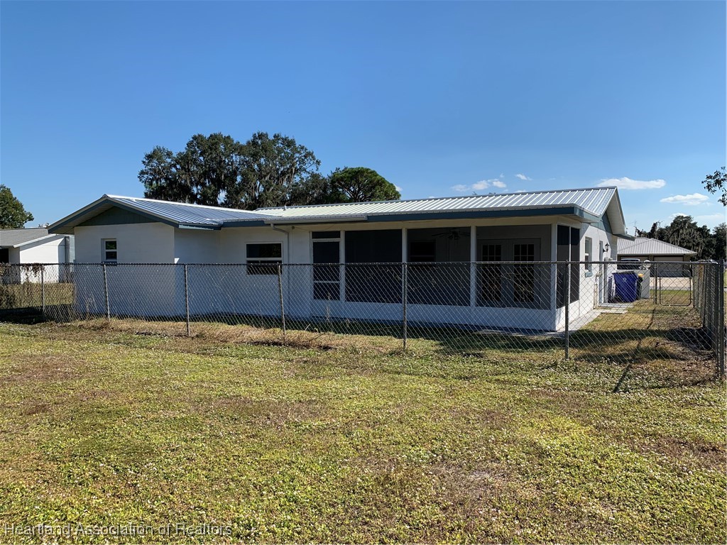 6101 Edgewater Terrace Sebring, FL 33876 - Photo 10 of 10 a view of a house with a backyard