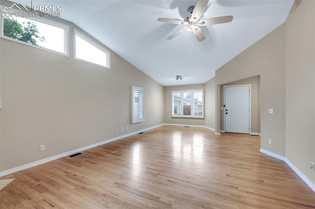 5125 Lewisia Point Colorado Springs, CO 80917 - Photo 8 of 32 wooden floor in an empty room with a window