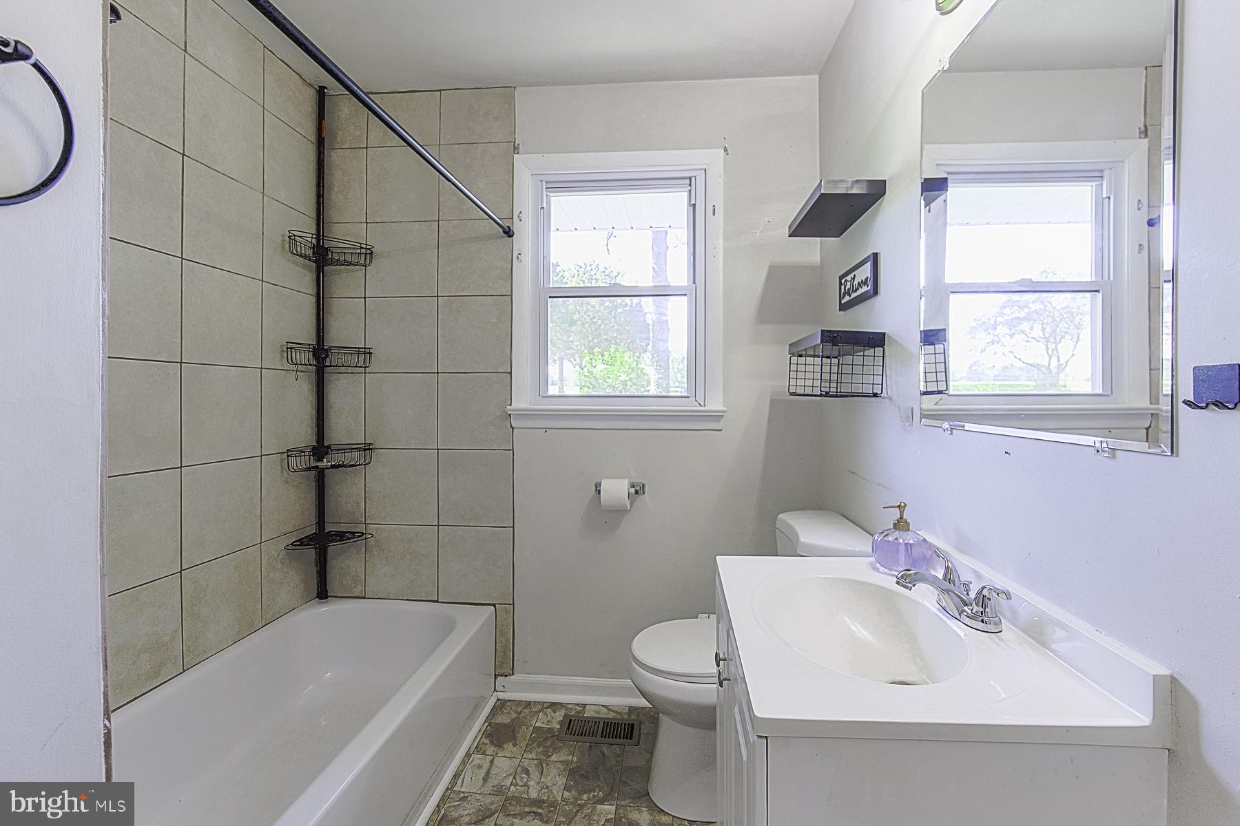 20121 Sparta Road Milford, VA 22514 - Photo 18 of 31 Bright and airy bathroom retreat.