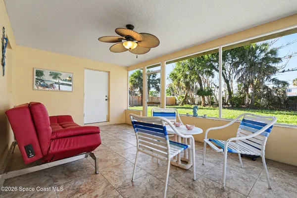 a outdoor space with patio couch and a table