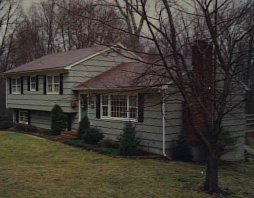 14 Round Hill Road Monroe, CT 06468 - Photo 1 of 1 front view of a house with a yard
