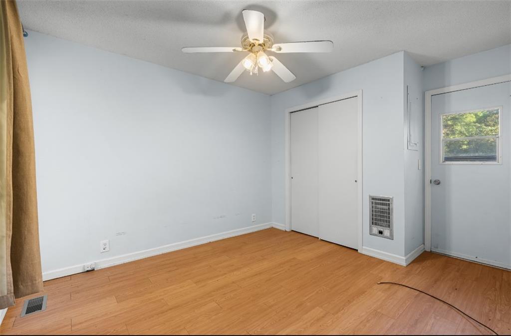 620 Wash Wilson Road Blue Ridge, GA 30513 - Photo 11 of 26 a view of a room with a ceiling fan and a chandelier fan