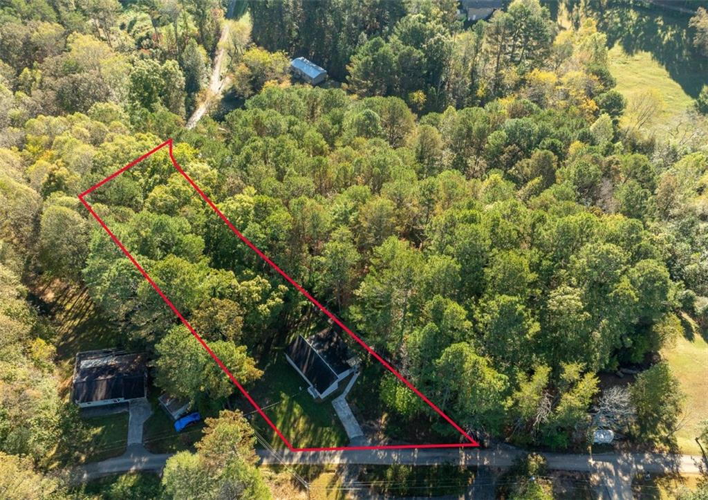 620 Wash Wilson Road Blue Ridge, GA 30513 - Photo 22 of 26 a backyard of a house with lots of green space