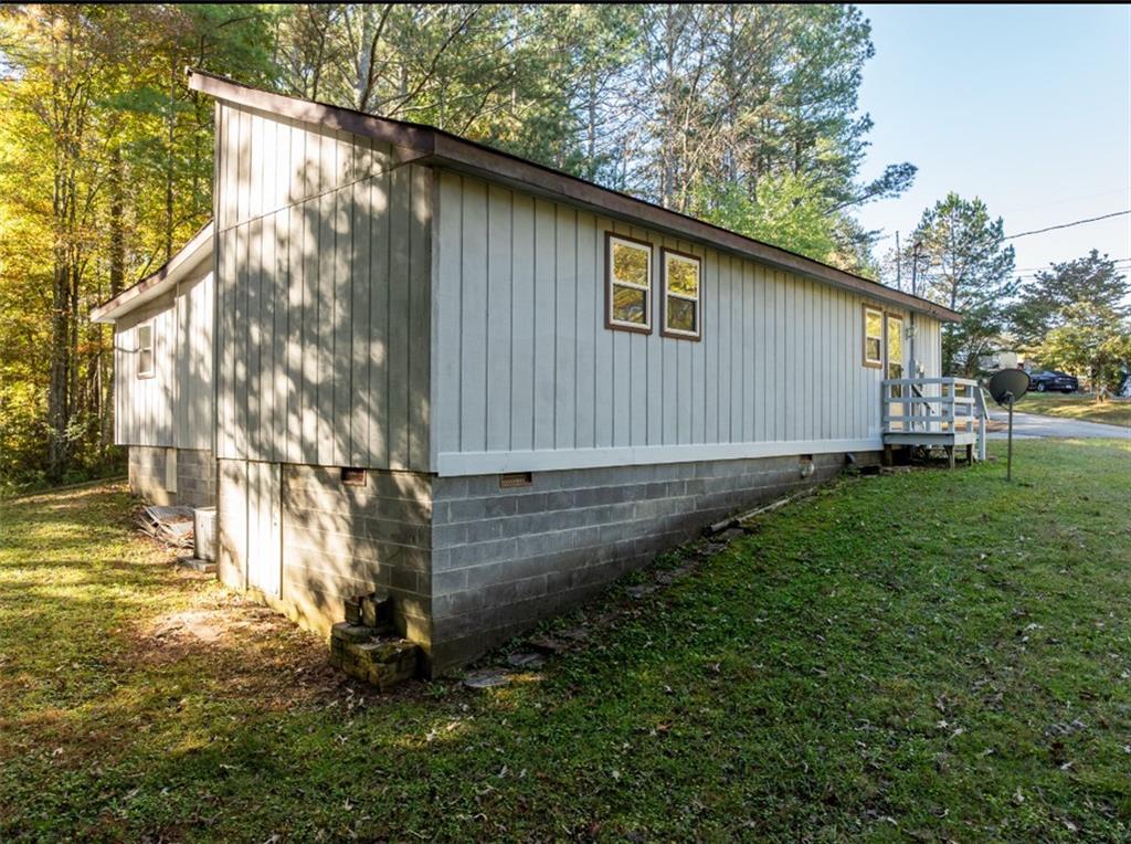 620 Wash Wilson Road Blue Ridge, GA 30513 - Photo 7 of 26 a backyard of a house with lots of green space