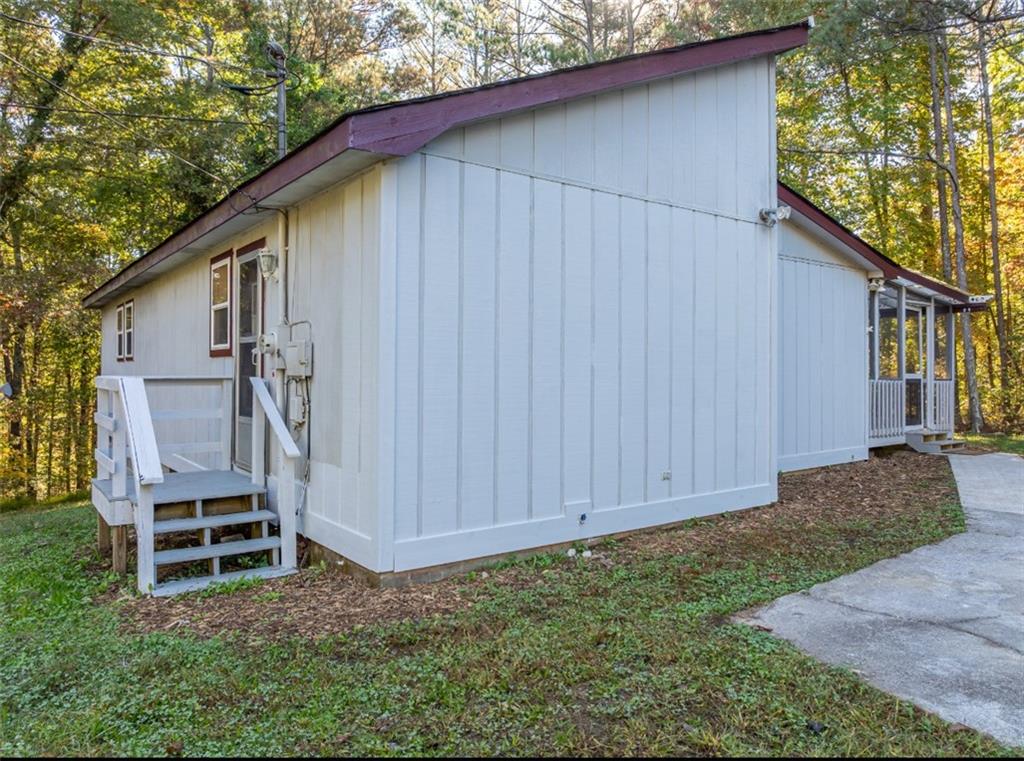 620 Wash Wilson Road Blue Ridge, GA 30513 - Photo 8 of 26 a backyard of a house with table and chairs