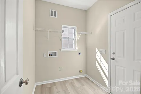 a view of a room that has a window in it