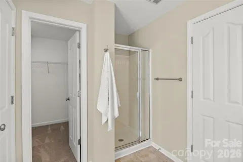 a view of a bathroom with a glass door